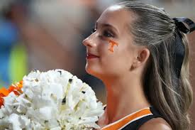 Photos of Tennessee's dark mode uniforms against Kentucky