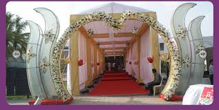 First thing which impresses the guests at the wedding is the main entrance decoration. 5 Beautiful Wedding Entrance Decorations For Special Day Wedding Entrance Wedding Entrance Decor Wedding Hall