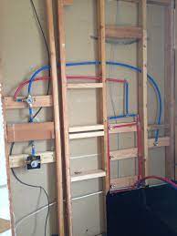Slide the clamp or crimp ring onto the pipe then slide the pipe onto the fitting all the way. Plumbing The Shower With Pex Diy Plumbing Pex Plumbing Bathroom Plumbing