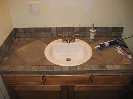 To prove our point there are some pictures of mosaic tile countertop bathrooms. Pin By Kim Pinkham On My Projects Tiled Countertop Bathroom Bathroom Countertops Tile Countertops