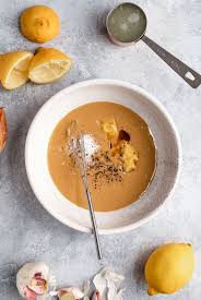 The Best Creamy Tahini Sauce Recipe Ambitious Kitchen Recipe Sauce Recipes Yummy Sweet Potatoes Tahini Sauce