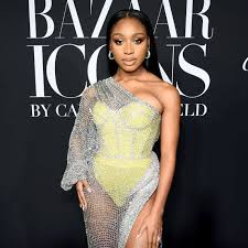 Including a silver tiara on top of her coif, a silver pendant on her white top, a white gold brooch on her. Normani Channels Naomi Campbell In Her Wap Music Video Cameo