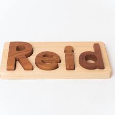 Custom made personalized wooden name puzzles for children, babies, or adults are a wonderfully unique gift that can include initials and symbols. Personalized Wooden Name Puzzle