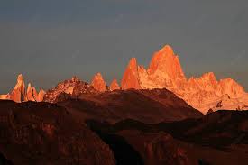 Patagonias Fitz Roy And Cerro Torre Mountains Illuminated By Sunrise In  Argentina Photo Background And Picture For Free Download