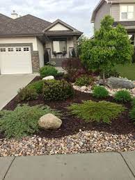 A mixture of plants that bloom at different times of the year and those with foliage that have interest such as striping, stippling, or uniquely patterned leaves should be used. Curb Appeal Farmhouse Landscaping Front Yard Landscaping Design Small Front Yard Landscaping