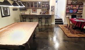 The new floor plan provided space for a convenient wet bar complete with wine storage and hammered copper sink. Stained Concrete Basement Floor Concrete Craft