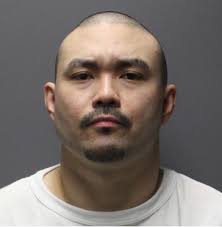 Man shot by Brooklyn Park police outside Walmart fired first, sported  'bandolero' ammo belt, BCA says