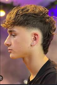 What are some edgy and progressive barber recommendations in Hudsonville?