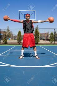 Carrying is a violation in the game of basketball. A Young Basketball Player Palming Two Basketballs Stock Photo Picture And Royalty Free Image Image 6268135