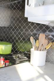 We will also have a stainless apron front farmhouse sink. Stainless Steel Arabesque Tile With Gray Grout Stainless Steel Kitchen Backsplash Stainless Steel Tile Backsplash Kitchen Backsplash Panels