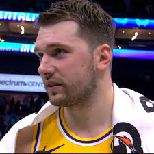 "We came out in the 3rd quarter and knew we needed to get the job done, so  that's what we did.", Luka Dončić (38 PTS, 6 REB, 7 AST) talks with  @miketrudell after the #Lakers 121-111 win in Charlotte. ...