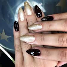 A nail designer will mix a liquid and powder and then brush the mixture into your nails is known as acrylic nails. 21 Beautiful Black And Gold Nail Designs Stayglam
