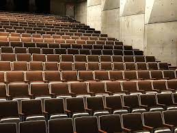 Black metal dining chairs with wood seats auditorium theatre stage. Hd Wallpaper Photography Of Theater Chairs Brown Theater Chair During Daytime Wallpaper Flare