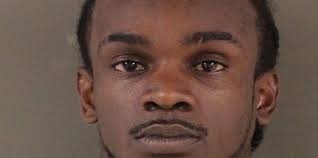 One arrested, one sought in October homicide