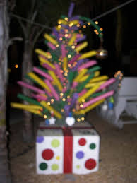 This Is Stage Three Finished Swimming Noodle Christmas Tree On A Large Box Fun In Yard By A Pool Or In A Garden Setting Xmas Candles Holiday Tree Xmas Tree