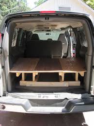 From A Chevy Express To A Diy Customized Camper Van Building The Bed And Table Chevy Express Minivan Camper Conversion Truck Bed Camping