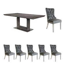 At scs, our range of extending dining tables take the stress out of hosting extra dinner guests or family. Ravenna 200cm Extending Dining Table With 6 Metropole Dining Chairs Grey Velvet All Dining Ranges Fishpools