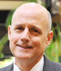 Harn at odds with Grand Jury report