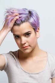 Closeup of a Violet Short-haired Girl Holding Her Hair Stock Image