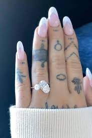 The 7 rings singer just shared a photo dump from her big day earlier this month, when she slid a wedding ring on her new husband, dalton gomez's finger.… visit direct link. Ariana Grande S Unique Engagement Ring From Dalton Gomez Is Almost Too Good To Be True Ariana Grande Nails Ariana Grande Tattoo Ariana Grande