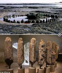 Seahenge, a 4,000-year-old wooden monument discovered in 1998 when shifting  sands exposed it on Holme-next-the-Sea beach along England's Norfolk coast.  Built in the spring of 2049 BC, the structure consists of an