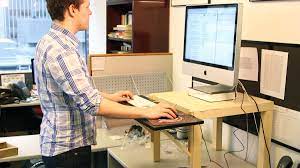 The upper part of the stand is perfect for monitor or laptops while the lower part is a great place for a keyboard and mouse. Build Your Own Standing Desk For 22 Money