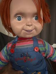 I got a surprise from my parents a 5 foot tall chucky. I'm sooo excited. My  daughter is holding my chucky doll o got a few weeks ago