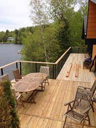 Lake House In Montreal Canada Elevated Deck Update With Cable Railing System From Stainless Cable Raili Deck Railing Design Deck Railings Wood Deck Railing