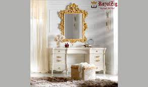 However, this design brings the cupboard and the dressing table together in a cohesive manner, with the help of a single attractive colour and a glossy finish. Royal Ivory And Gold Dressing Table And Mirror Set Royalzig