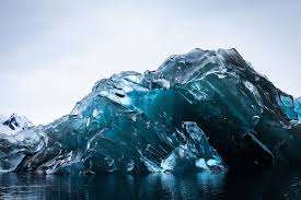 An iceberg is a large piece of freshwater ice that has broken off from a glacier or ice shelf and is floating in open water. An Iceberg Flipped Over And Its Underside Is Breathtaking Science Smithsonian Magazine