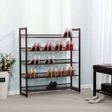 This shoe rack bench is an ideal solution for an entryway to organize your shoes so they're not an eyesore when you first walk in the door! Front Door Shoe Storage Wayfair