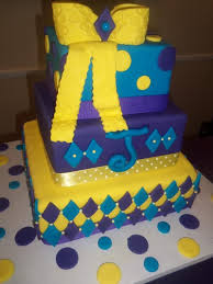 We love the scalloped bottom tier on the cake. Blue Purple Yellow Cake Yellow Cake Cake Sugar Art