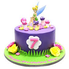 The cake was our signature decandent chocolate ganache cake, a rich dark chocolate sponge cake filled with several layers of milk. Tinkerbell Cake 6