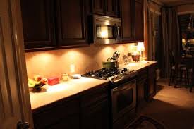 While you might be considering using some sort of under cabinet lighting, how about you try lighting the parts above your kitchen cabinet as well? Another Easy Update Under Cabinet Lighting Decorchick Under Cabinet Lighting Cabinet Lighting Home Kitchens