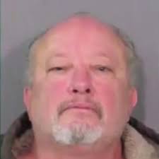 Brain dead' man wakes up after father threatened to shoot medics trying to  turn off life support