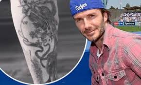 The sweet tribute is one of five inkings he has dedicated to nicola with the. David Beckham Reveals New Shin Tattoo Daily Mail Online