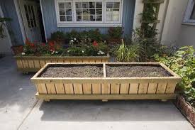 Raised Bed Planter On Wheels Design Brilliant Especially If You Want To Make Use Of A Long Sunny Driv Patio Planter Boxes Raised Planter Beds Veggie Garden