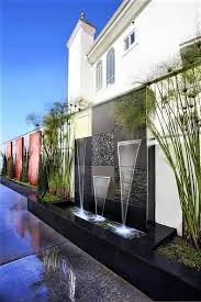You Can Turn One Of Your Patio S Dull And Boring Wall Into This Amazing And Stunning Wat Water Features In The Garden Modern Landscaping Outdoor Water Features