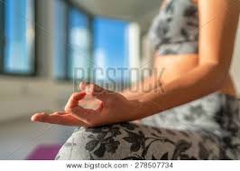 Check spelling or type a new query. Yoga Class At Gym Studio Woman Meditating With Hand Mudra In Lotus Pose In Morning Sun Yoga Practice Meditation Healthy Living At Home Lifestyle Reaching Higher Consciousness With Mantras Poster Id 278507734
