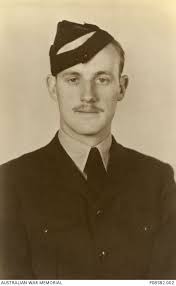 Studio portrait of 403832 Aircraftman (AC) (later Flight Lieutenant) John Gilbert  Spence, 70 ...