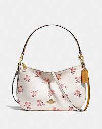 Inside is clean without stains. Ø¥Ù…Ø¨Ø±Ø§Ø·ÙˆØ±ÙŠ Ø¥Ø®ØªØ·Ø§Ù Ø®Ø²Ø§Ù†Ø© Coach Flower Crossbody Bag Psidiagnosticins Com