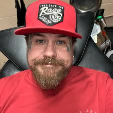 Where to find tattoo parlors in Michigan with get what you get gum ball  machines?