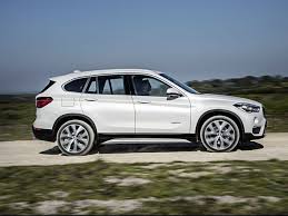 Mark Phelan Bigger 2016 Bmw X1 Suv Hits U S Roads In Fall Bmw Suv Hyundai Hybrid Bmw
