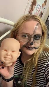 My flamingo Girl needed to get into the Fall spirit so I gave her a  skeleton.