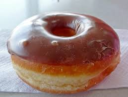 Queste ciambelle americane, preparate con una pasta lievitata. Ricetta Donuts Ciambelle Homer Simpson