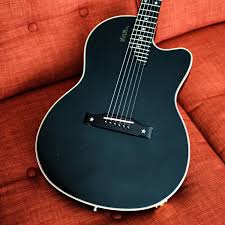 Gibson Black Acoustic Electric Guitar You Ve Heard Of The Country Gentleman But Have You Ever Seen A Gibson Chet Atkins Sst These Acoustic Electric Hybri Chet Atkins Beautiful Guitars Cool Guitar