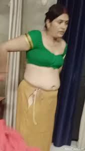 Mature blonde undresses to milk his dick