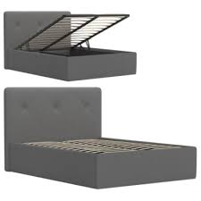 Actuellement l'accès au coffre se fait par des trappes situées sur les côtés, mais ce n'est pas pratique. Lit Coffre 140x190 Cm Syla Pu Gris Lits But Meuble Canape Lit Coffre Lit Coffre 140x190