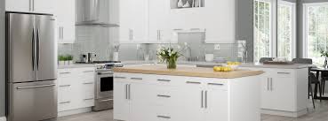This elegant white and gray kitchen showcases modern design, from the decorative tile backsplash that runs from the marble countertops to the ceiling. Are Light Or Dark Cabinets Right For My Space Wolf Home Products