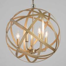Five Candelabra Lights Shine Through The Open Design Of Our Exclusive Antique Brass Orb Chandelier Living Room Light Fixtures Orb Chandelier Candelabra Light